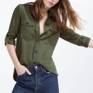 Military style green shirt.